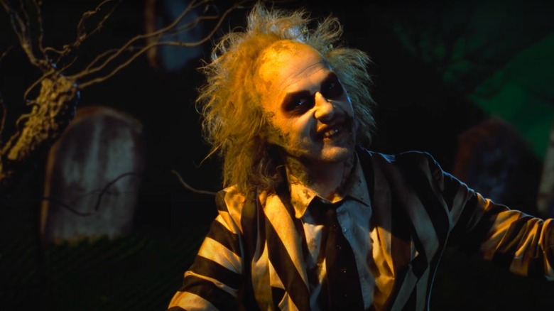 Beetlejuice smiling in graveyard